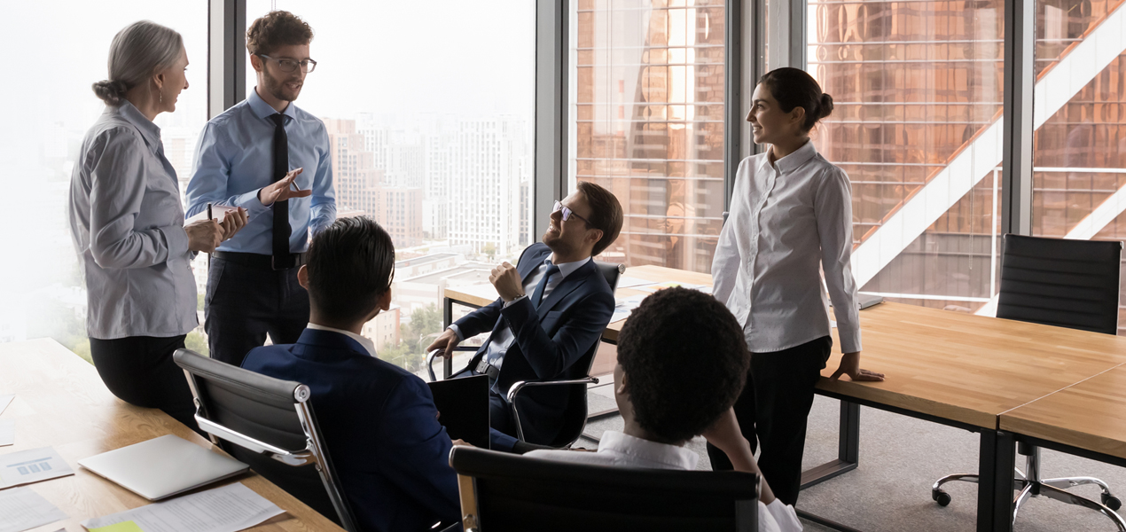 Group of business people brainstorming in an office.