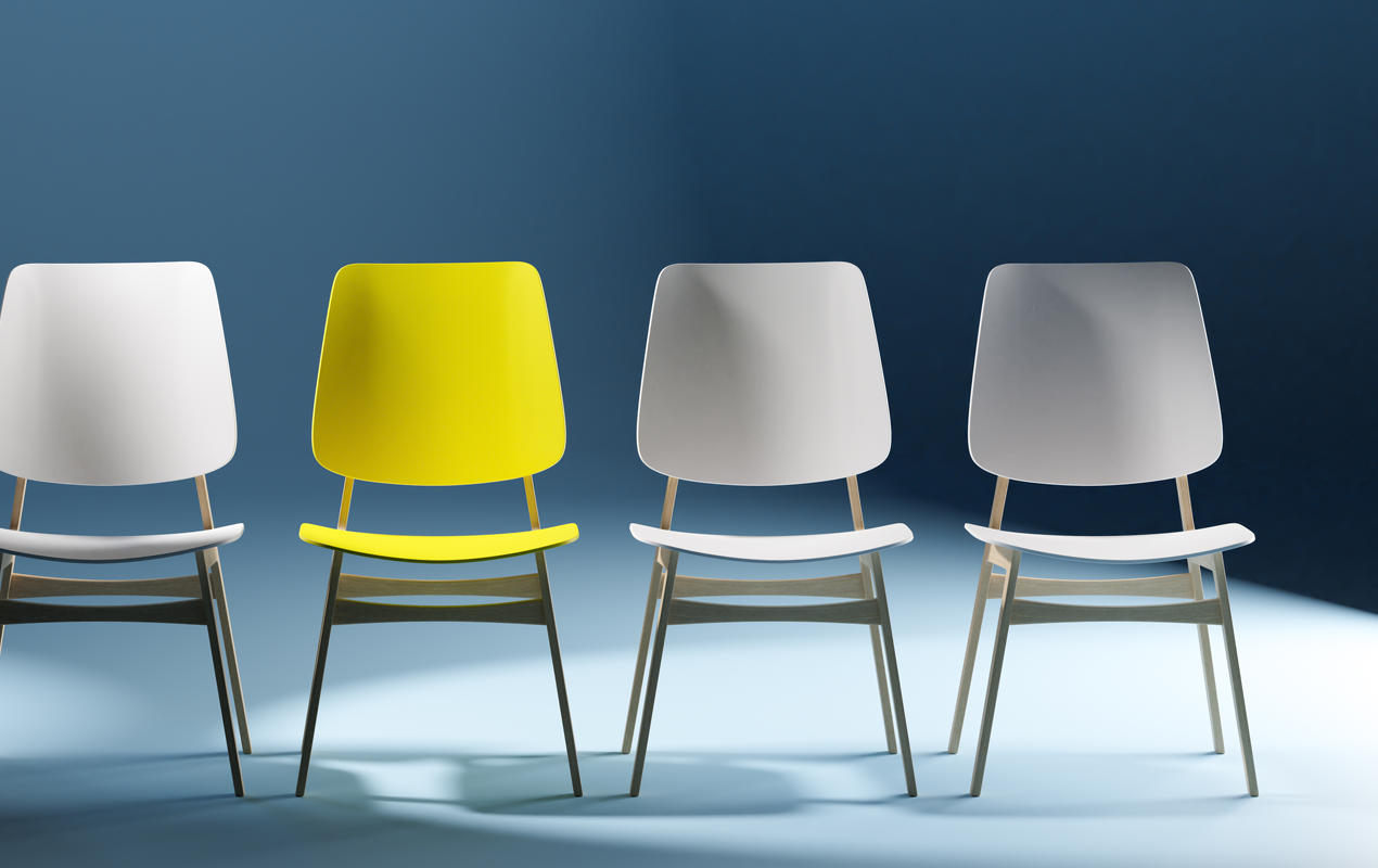 Five modern chairs in a row against a blue background, with the middle chair being yellow and the others white.