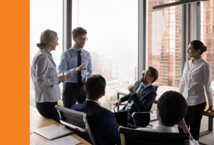 Group of business people brainstorming in an office.